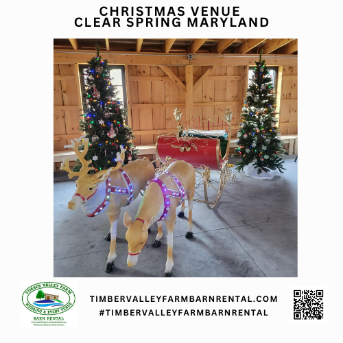 Santa’s sleigh and reindeer inside our Venue Timber Valley Farm Barn Rental for holiday photos.
