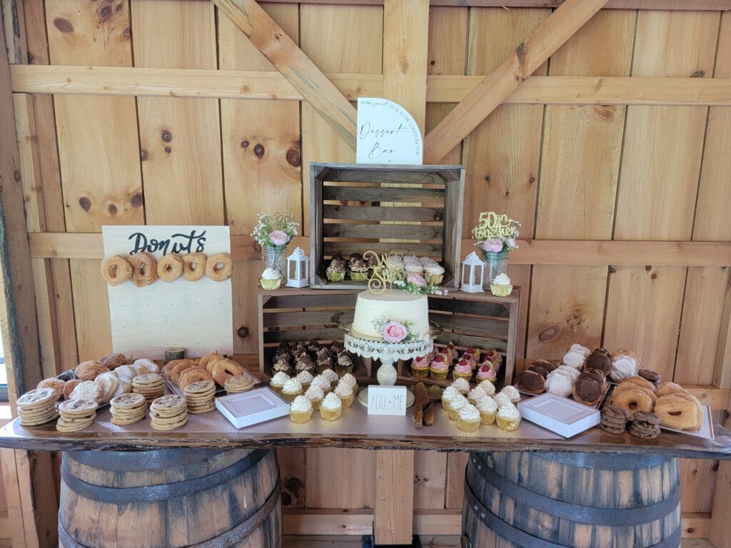 The Unique Charm of an Anniversary Party Venue Celebration Maryland
A truly spectacular anniversary celebration is a celebration of love’s timeless bond. Our timber frame barn provides the ideal aesthetic for such an event. The exposed beams and natural wood tones create an atmosphere of warmth and enduring strength, perfect for reaffirming years of commitment. While we do not feature an outdoor patio, the entire barn opens up with large sliding doors, seamlessly connecting your celebration to the gorgeous surrounding fields. This creates a flexible, airy space that allows guests to mingle indoors and out while enjoying the beautiful country views.