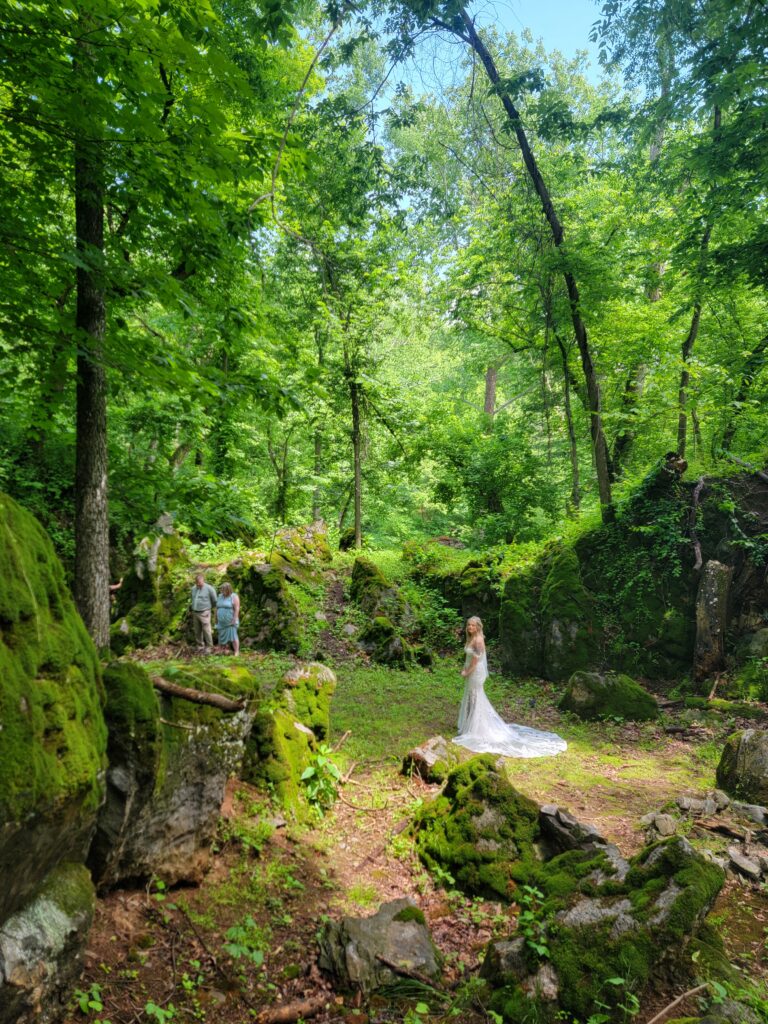 Are you dreaming of a wedding where the whispers of the wind replace traditional vows, and ancient trees stand as your witnesses? Do you envision an aisle carved by nature herself, leading you to a ceremony bathed in the soft, dappled light of a woodland canopy? If your heart beats for an all-natural backdrop, brimming with rustic charm and breathtaking beauty, then look no further than The Cove at Timber Valley Farm Barn Rental, the ultimate Woodland Wedding Venue.