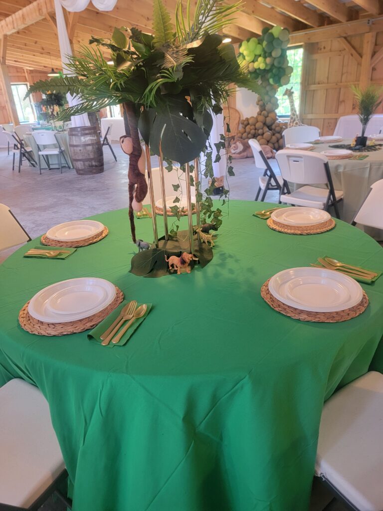 A Magical and Comfortable Setting
Imagine soft pastel decorations, tiny little onesies strung like bunting, and the gentle clinking of teacups as friends and family gather to shower the expectant parents with well wishes. That’s exactly the scene we had the joy of witnessing! Our spacious barn, with its soaring ceilings and warm wooden beams, provided the perfect backdrop for this special occasion.