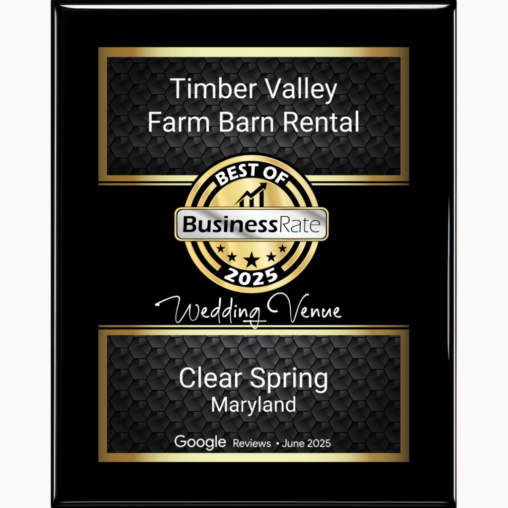 The Quiet Professionalism That Saves Your Day
Tom and Karen’s dedication goes far beyond basic hospitality. They monitored the high winds, cleaned up major damage (a broken tent and glass), and flawlessly adapted the ceremony setup without the couple even knowing until weeks later. This thoughtful, behind-the-scenes professionalism is a guarantee when you choose our family-owned venue. Furthermore, to ensure their dream photos were captured, Tom personally drove the couple back to the “Enchanted Forest” area on the property—a small gesture that made a huge difference. Our local knowledge and commitment to excellence are what transform a great wedding into a magical, stress-free celebration at Modern Barn Wedding Venue Maryland.