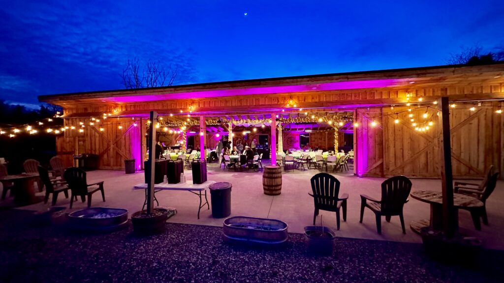 2. Special Event Lighting and Ambiance 🦅
When the sun sets over the Potomac River, Timber Valley Farm Barn Rental transforms. Our special event lighting is designed to highlight the intricate craftsmanship of the timber frame while creating a festive, inviting glow. From the warm bistro lights that line the patio to the vibrant green accent lighting that celebrates our "green" and evergreen philosophy, the ambiance at this special event venue is second to none. 🌊