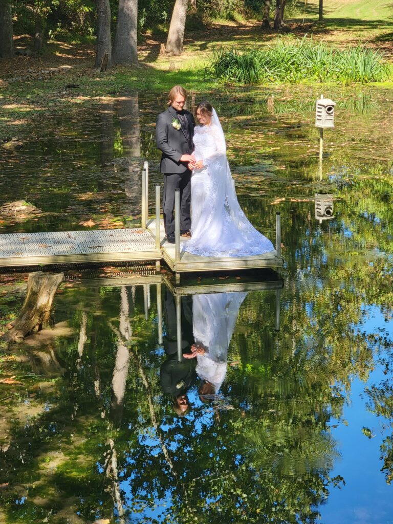 The Pristine, Spring-Fed Pond

Water adds an undeniable element of romance and tranquility to any imagery. The pristine, spring-fed pond on our property serves as a magnificent mirror, reflecting the soft colors of the sky and the surrounding greenery. This creates a peaceful, timeless setting that brings a sense of deep serenity to your wedding collection.