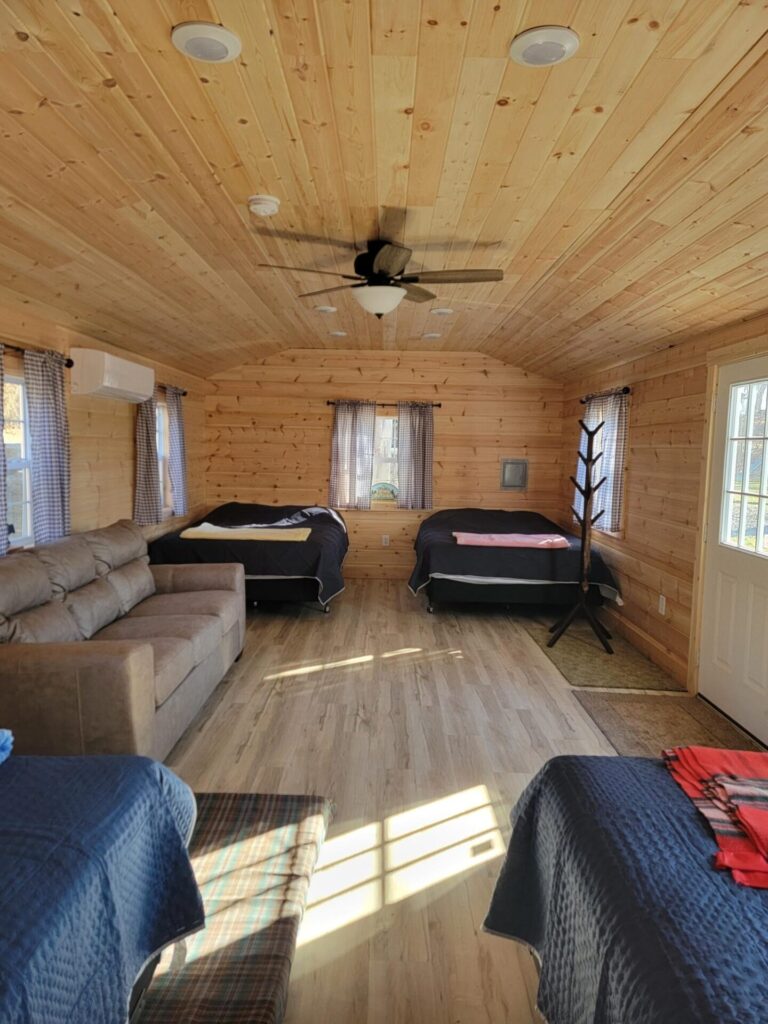 Rustic Wedding Lodging Maryland featuring Jake's Bunkhouse at Timber Valley Farm Barn Rental with comfortable Wedding Guest Cabins Maryland for family, friends, and Bridal Party Lodging.