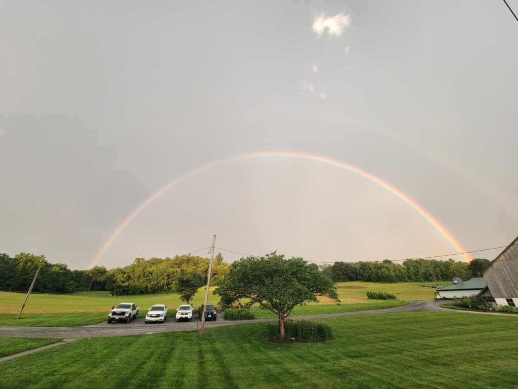Rainbows at Timber Valley featuring a breathtaking double rainbow over Timber Valley Farm Barn Rental in Clear Spring, Maryland after a passing summer rainstorm.