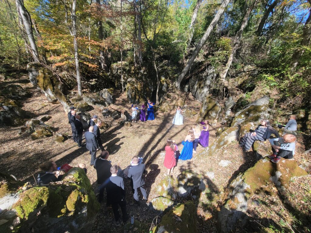 Wedding party gathering for pre-ceremony photos at God's Cathedral during a Wedding Weekend Venue Western Maryland celebration at Timber Valley Farm Barn Rental.