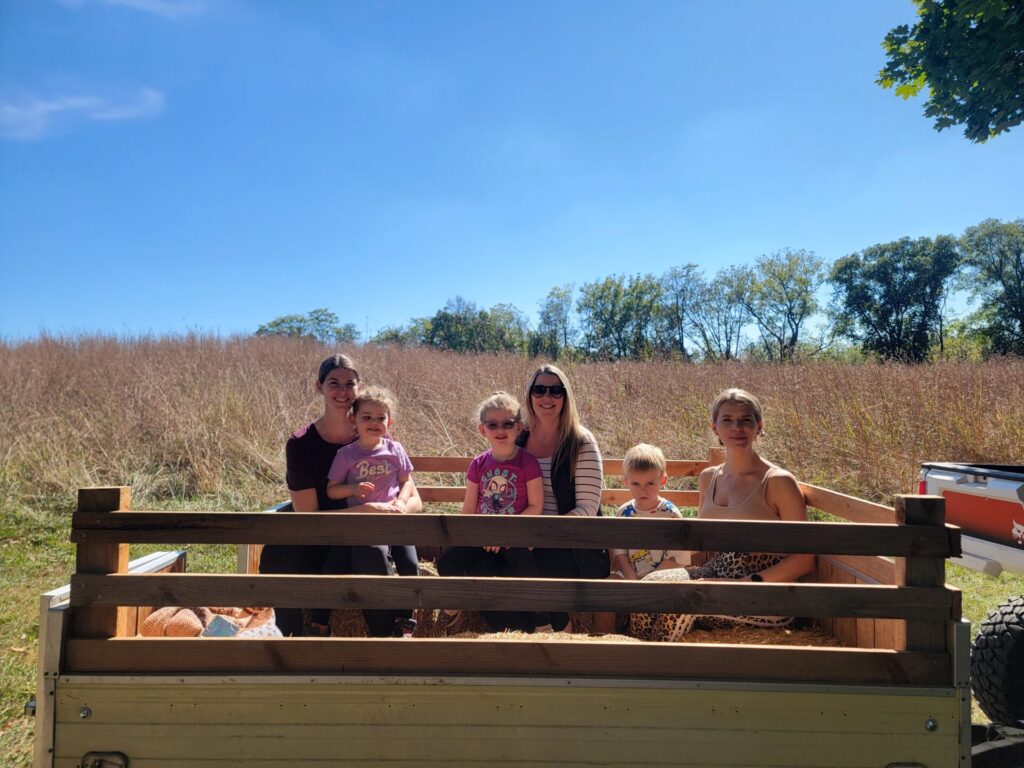 the Timber Valley Trailblazer Little Wagon with families on a fall fest wagon ride.