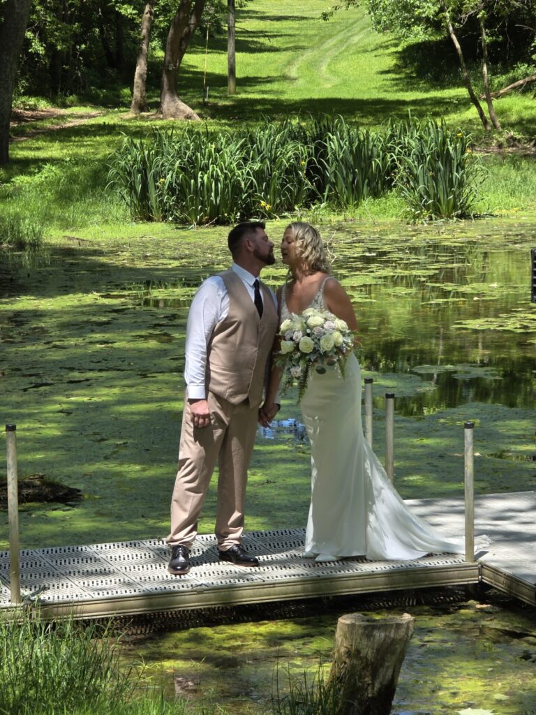 Wedding Ceremony Venue Planning includes wedding portraits beside the pond at Timber Valley Farm Barn Rental in Clear Spring, Maryland.