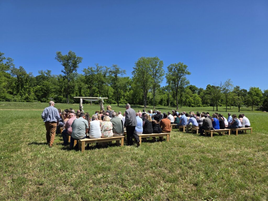 Timber Valley Virtual Tour showing a wedding ceremony in the meadow surrounded by trees and open space in Clear Spring Maryland