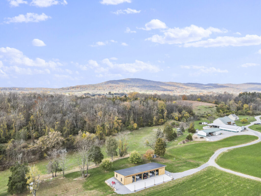Timber Valley Virtual Tour showing the timber-frame barn surrounded by wooded grounds and rolling countryside in Clear Spring Maryland