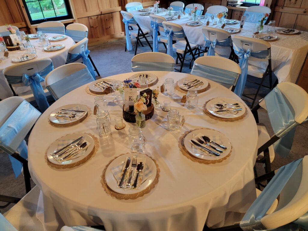 Timber Valley Virtual Tour showing a beautifully decorated wedding reception table inside the timber-frame barn in Clear Spring Maryland