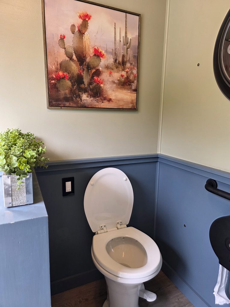 Luxury portable restroom interior with modern amenities for weddings and events at Timber Valley Farm Barn Rental in Clear Spring, Maryland